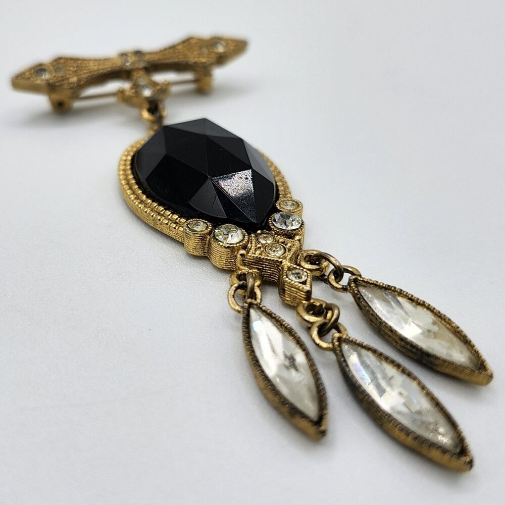 1928 Jewelry Co. Goldtone Brooch w/ Black Faceted Cabochon & Dangling Crystals